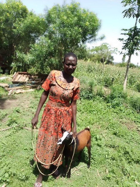 Jane Adhiambo with her goat
