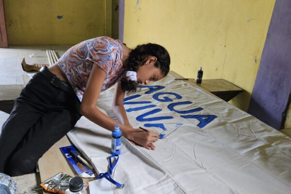 Estafany working on the banner