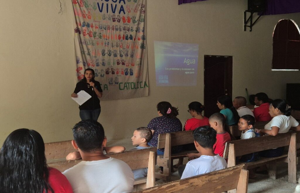 Evelin Sanchez (AVI Educator) offering the intrductory lesson to the community