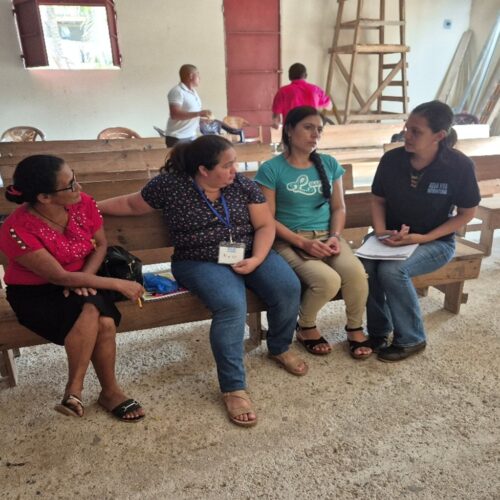 Evelin Sanchez (AVI Educator) on the far right had side in a meeting with Local Educators to plan their afternoon class to community people