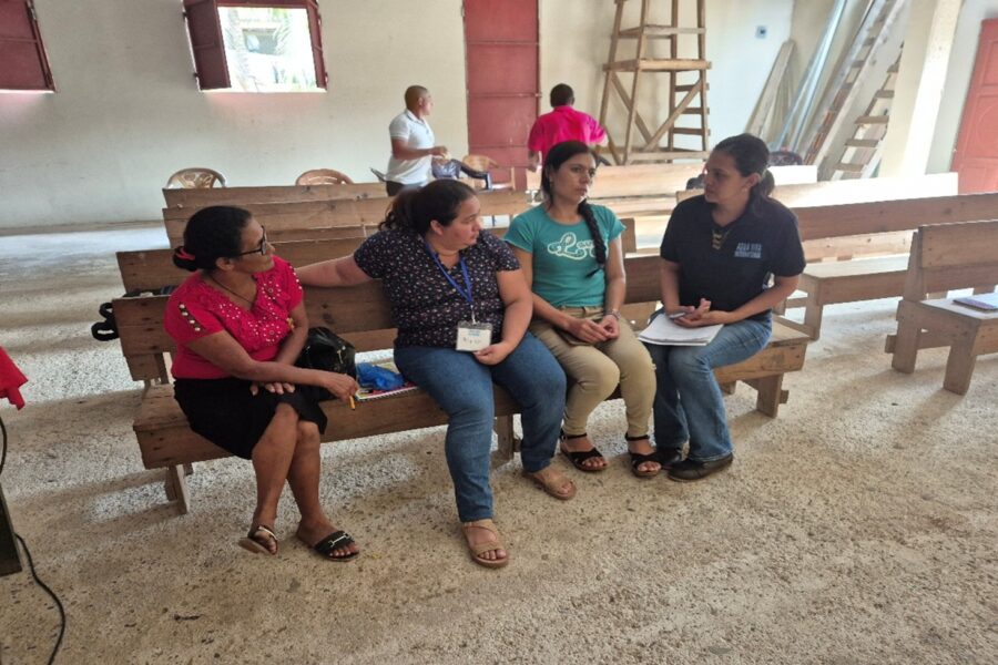 Evelin Sanchez (AVI Educator) on the far right had side in a meeting with Local Educators to plan their afternoon class to community people