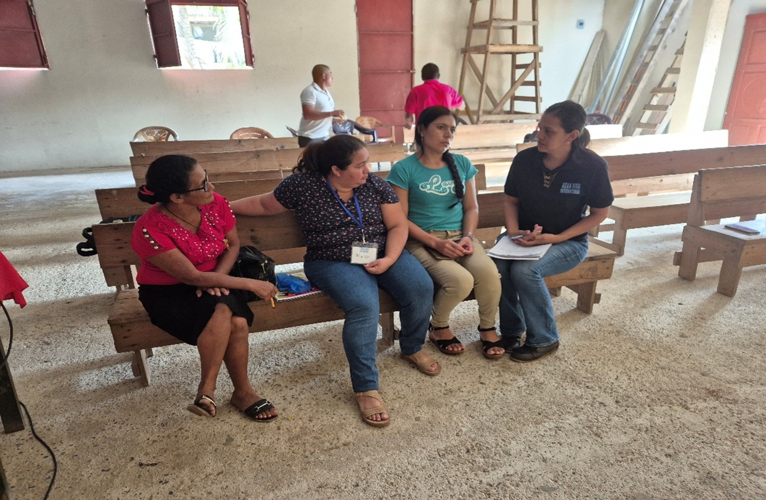 Evelin Sanchez (AVI Educator) on the far right had side in a meeting with Local Educators to plan their afternoon class to community people