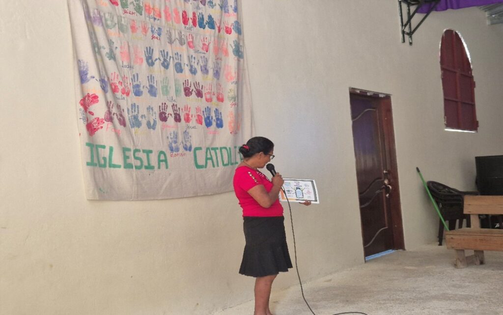 Orbelina (Local Educator) teaching the 5 main uses of pure water