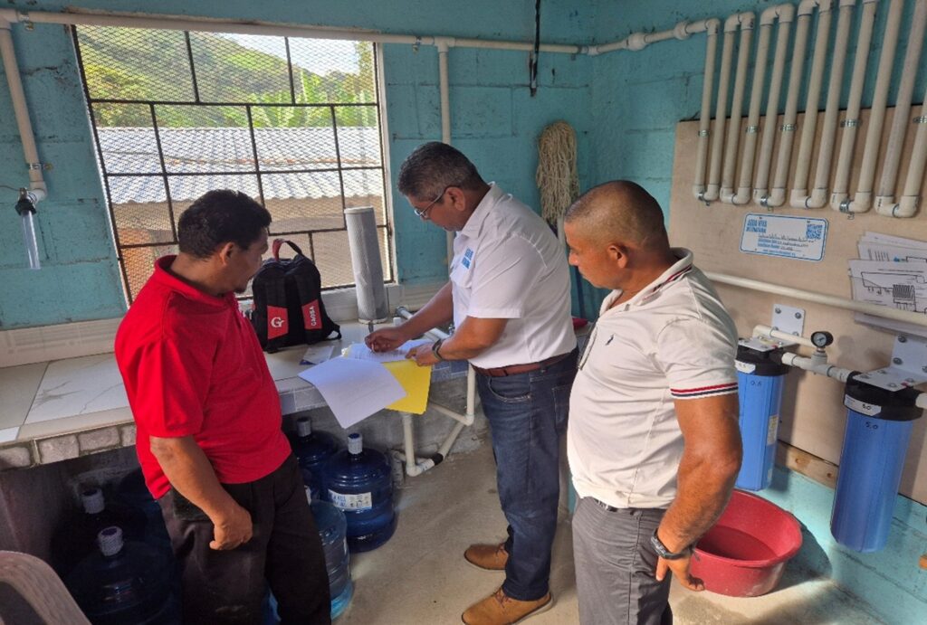 Rigo Rios (In Country Coordinator) teaching the Local Operators about record keeping