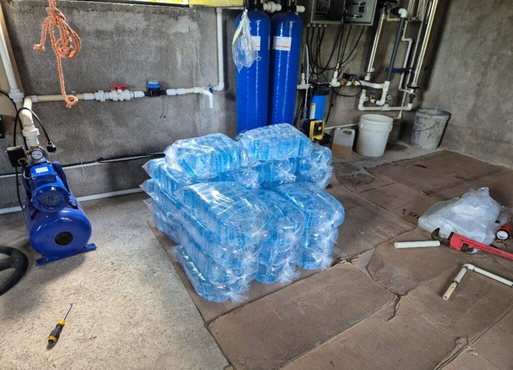 In this picture we can see the bulks containing each 30 bags of 500 ml of water